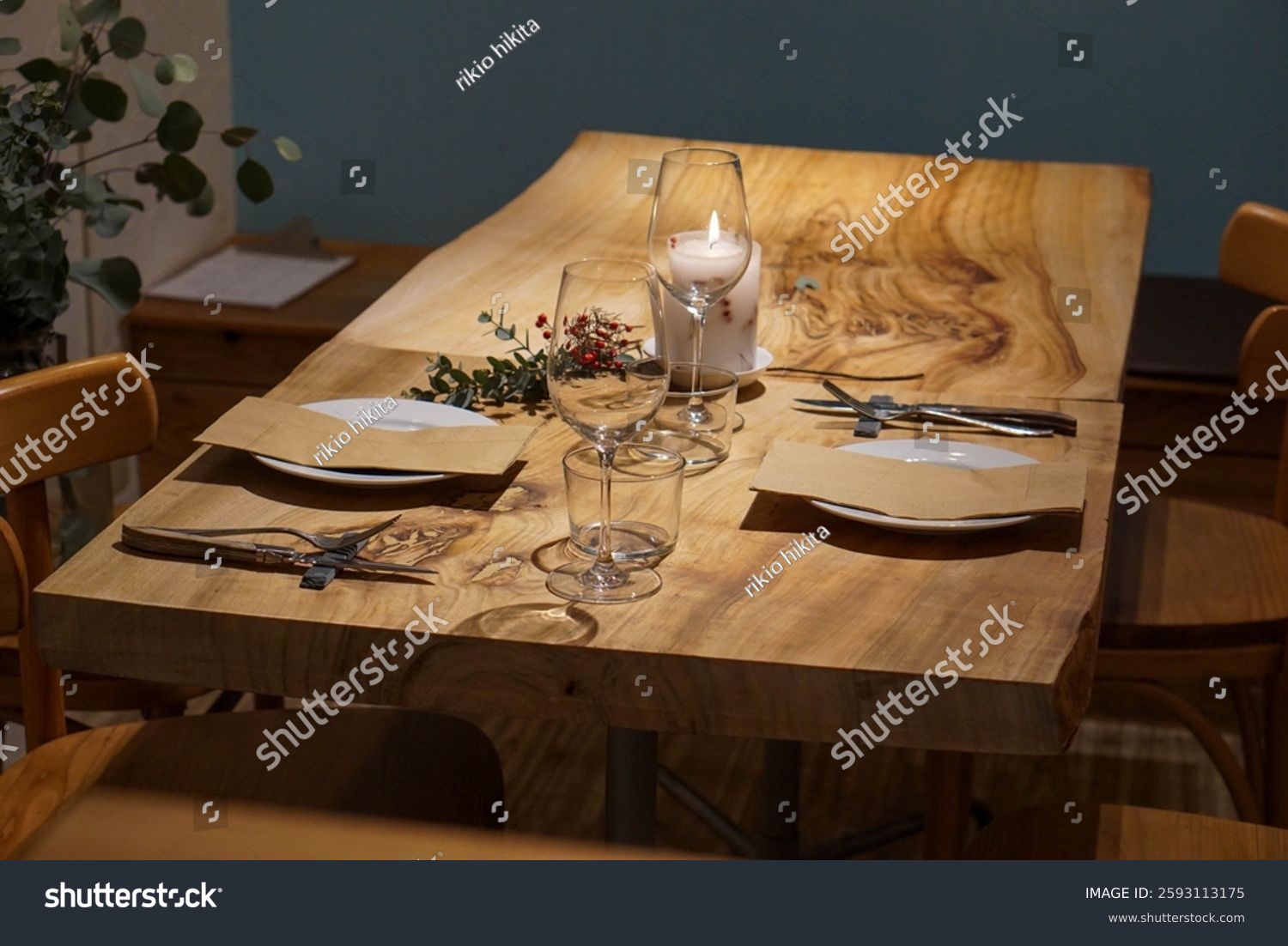 stock-photo-dining-table-cozy-atmosphere-candlelight-fine-dining-2593113175